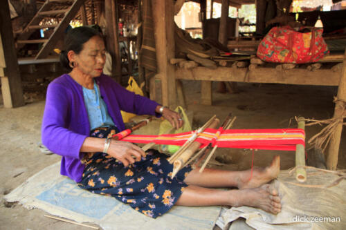 Tattood Chin lady weaving